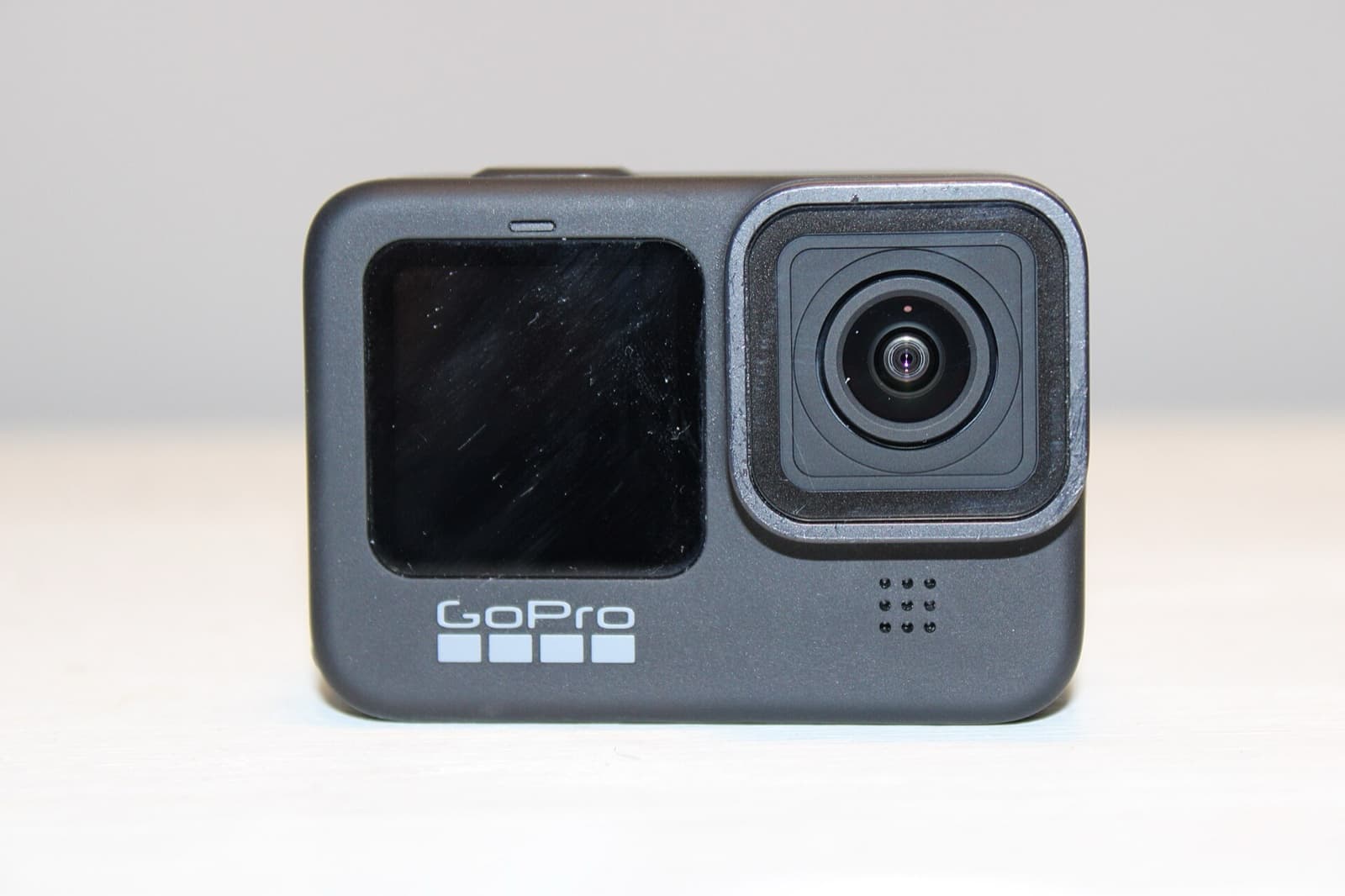 Black GoPro action camera seen from the front, showing its lens and small front screen