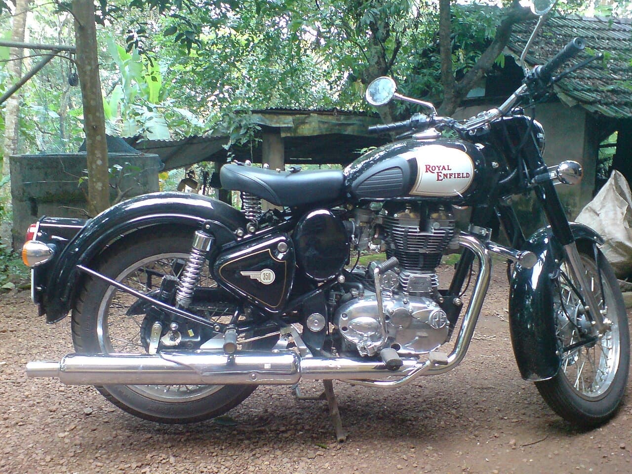 Black Royal Enfield Classic 350, right side view showing engine and exhaust